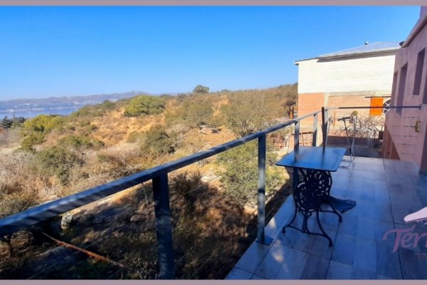 MUY LINDA CASA CON HERMOSA VISTA AL LAGO SAN ROQUE