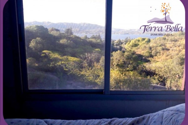 MUY LINDA CASA CON HERMOSA VISTA AL LAGO SAN ROQUE