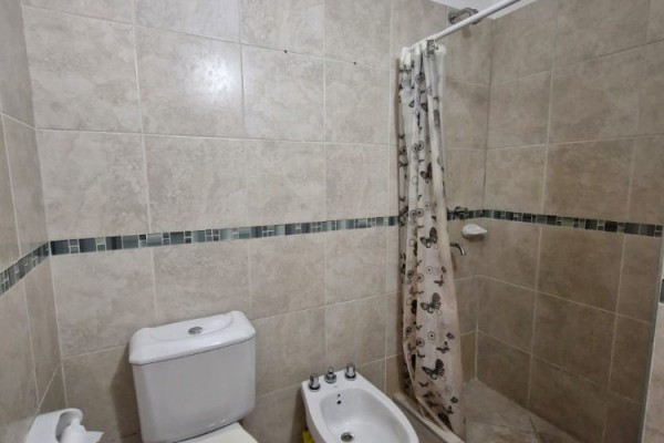 DEPARTAMENTO CENTRICO - UN DORMITORIO CON BALCON-PISCINA-COCHERA