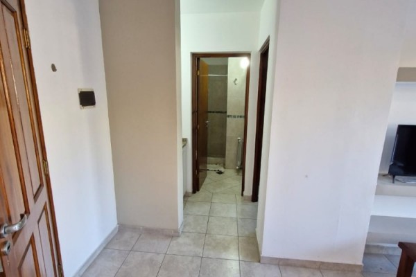DEPARTAMENTO CENTRICO - UN DORMITORIO CON BALCON-PISCINA-COCHERA