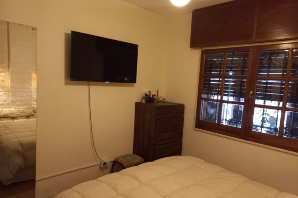 DEPARTAMENTO CENTRICO. UN DORMITORIO. PATIO Y PISCINA PROPIOS