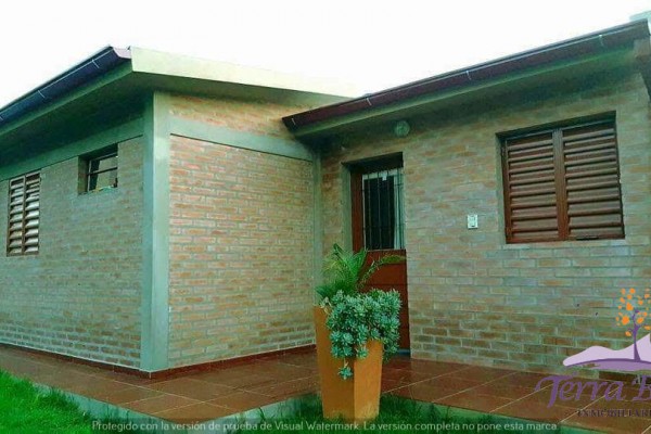 DEPARTAMENTO FRENTE AL LAGO CON PATIO. ASADOR. COCHERA