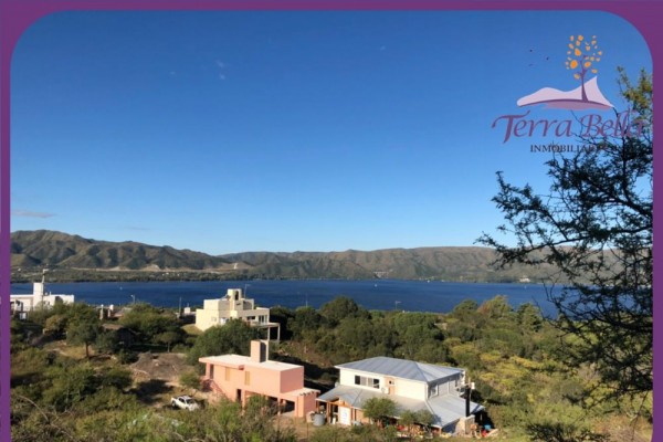 MUY LINDA CASA CON HERMOSA VISTA AL LAGO SAN ROQUE
