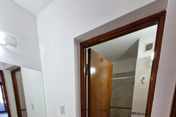 DEPARTAMENTO CENTRICO - UN DORMITORIO CON BALCON-PISCINA-COCHERA