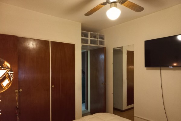 DEPARTAMENTO CENTRICO. UN DORMITORIO. PATIO Y PISCINA PROPIOS